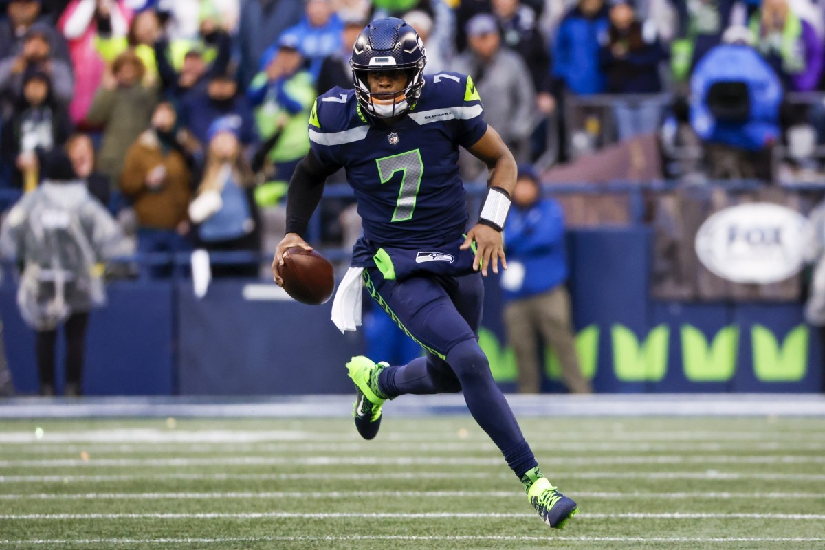Seahawks quarterback Geno Smith led Seattle to the playoffs in overtime against the Rams in Week 18.