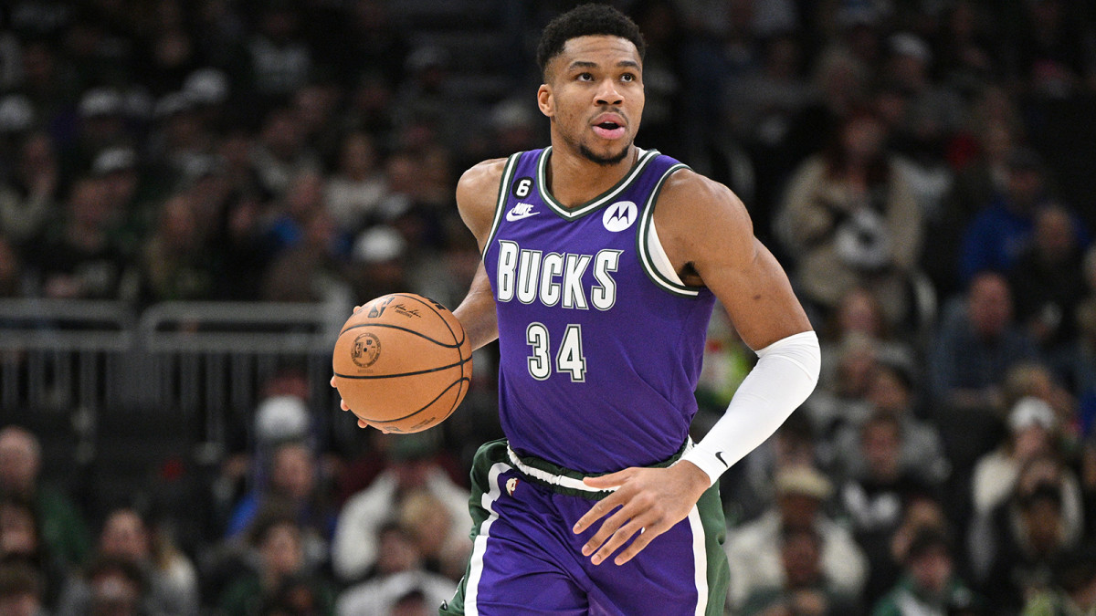 Milwaukee Bucks forward Giannis Antetokounmpo (34) brings the ball up the court against the Charlotte Hornets in the first half at Fiserv Forum.