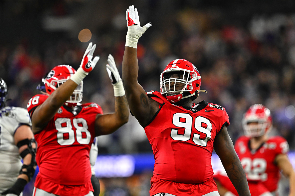 Georgia defensive line celebrates after a sack.