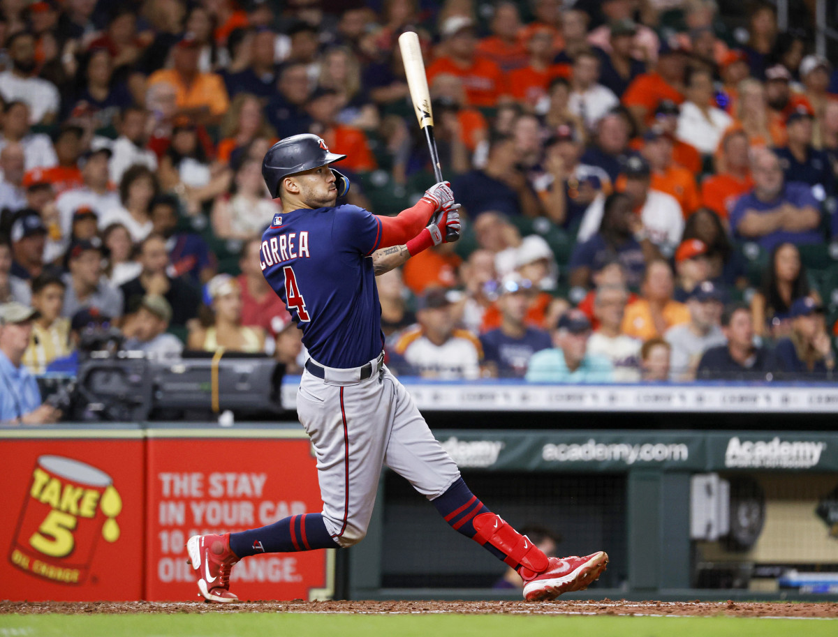 Twins shortstop Carlos Correa hits a single during the seventh inning against the Astros at Minute Maid Park.