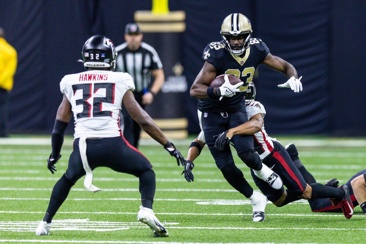New Orleans Saints tight end Juwan Johnson (83) after a catch against the Atlanta Falcons. Mandatory Credit: Stephen Lew-USA TODAY Sports