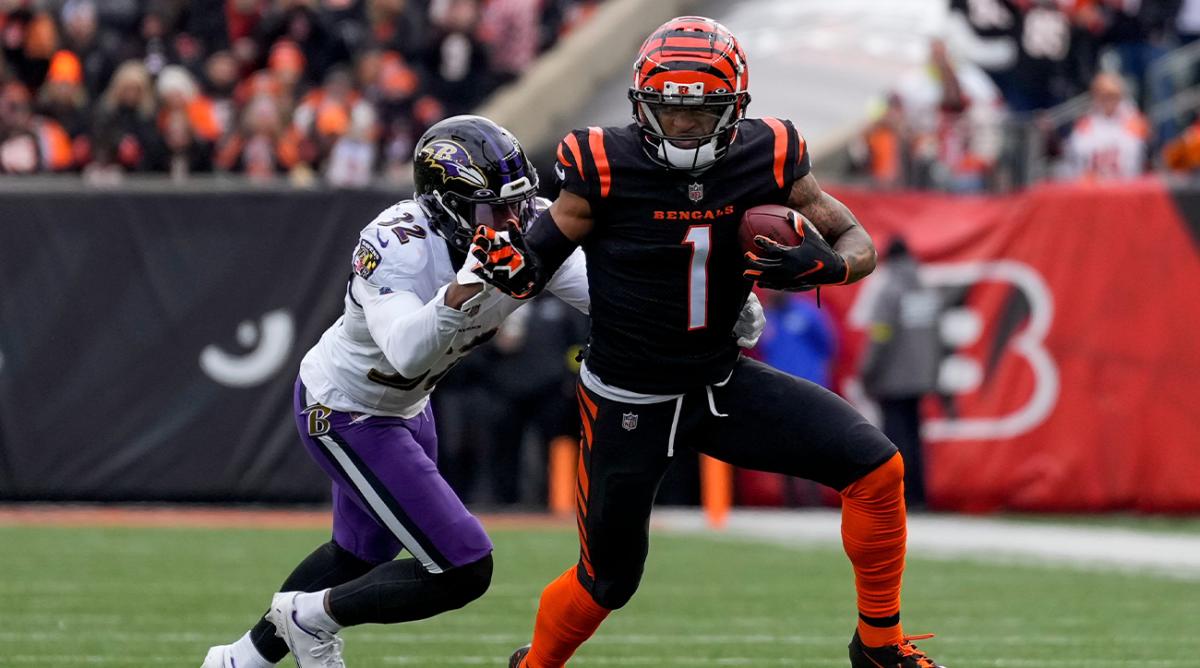 Cincinnati Bengals wide receiver Ja’Marr Chase (1) breaks away from Baltimore Ravens safety Marcus Williams (32) on a reception in the first quarter of the NFL Week 18 game between the Cincinnati Bengals and the Baltimore Ravens at Paycor Stadium in downtown Cincinnati on Sunday, Jan. 8, 2023.
