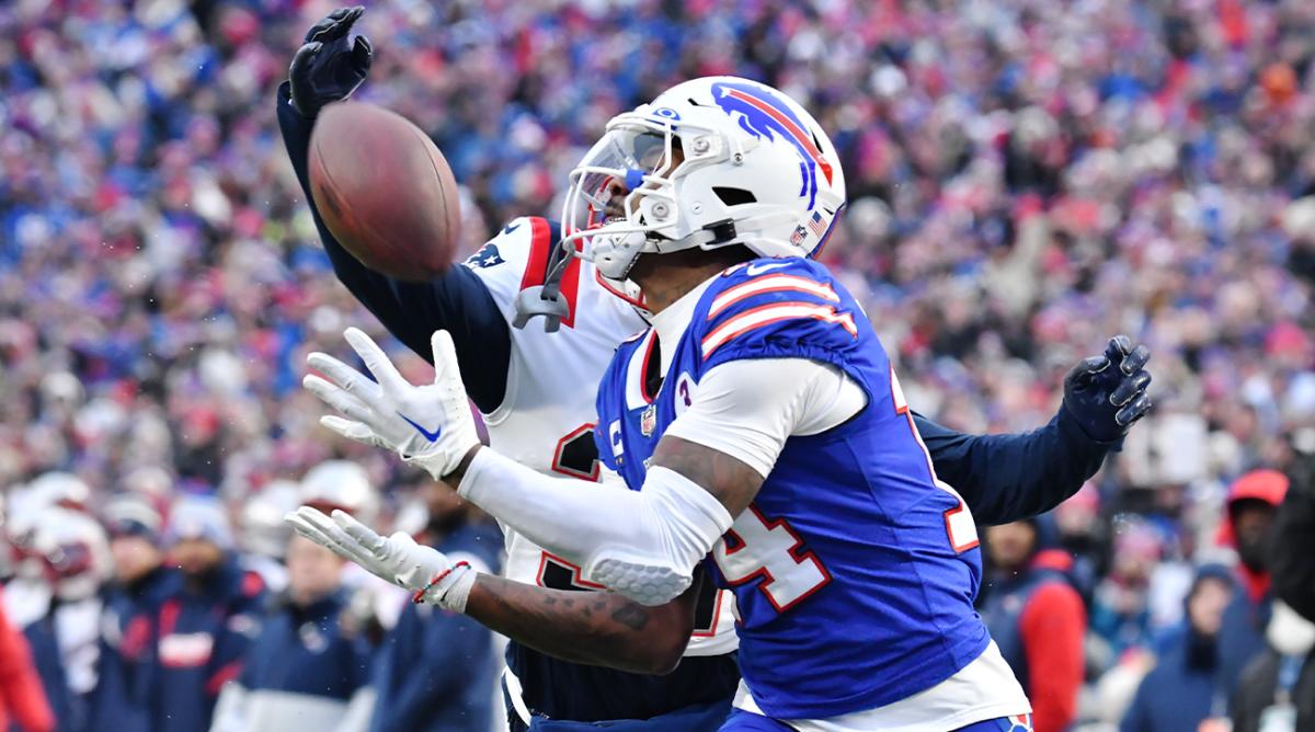 Jan 8, 2023; Orchard Park, New York, USA; Buffalo Bills wide receiver Stefon Diggs (14) catches a 49 yard touchdown against the New England Patriots in the fourth quarter at Highmark Stadium.