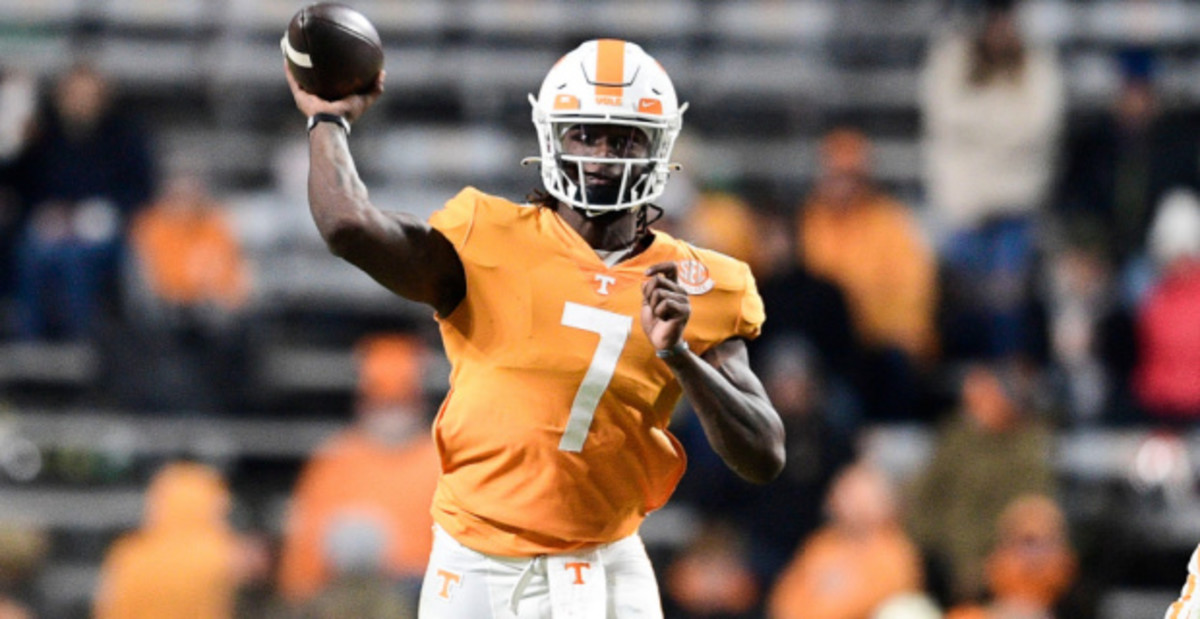 Tennessee Volunteers quarterback Joe Milton attempts a pass during a college football game in the SEC.