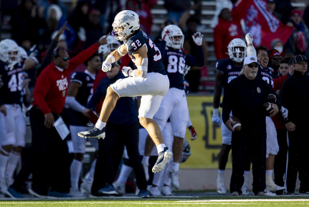 Evan Williams celebrates a turnover against UTEP in the 2021 New Mexico Bowl.