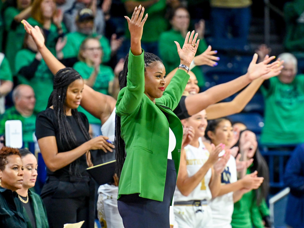 Notre Dame head coach Niele Ivey celebrates in the closing seconds of a win against the UConn Huskies.