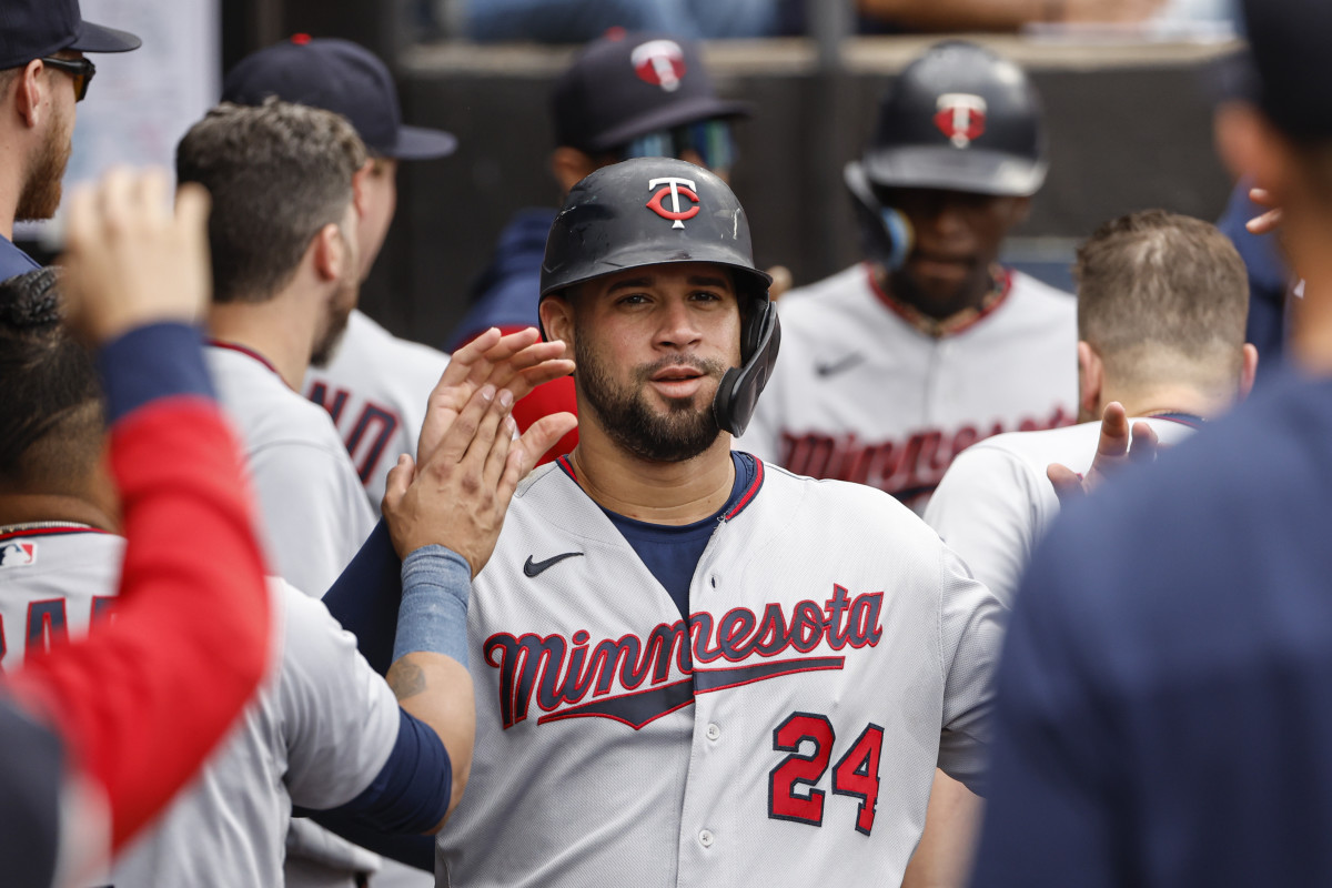 Minnesota Twins catcher Gary Sanchez (24) celebrates with teammates after scoring against the Chicago White Sox during the second inning at Guaranteed Rate Field. (2022)