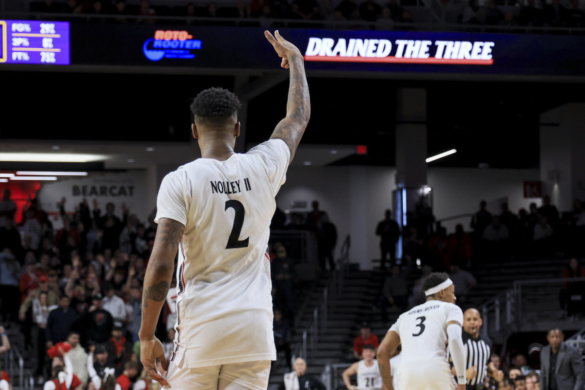 Jan 11, 2023; Cincinnati, Ohio, USA; Cincinnati Bearcats guard Landers Nolley II (2) reacts to making a three-point basket against the East Carolina Pirates in the second half at Fifth Third Arena. Mandatory Credit: Aaron Doster-USA TODAY Sports