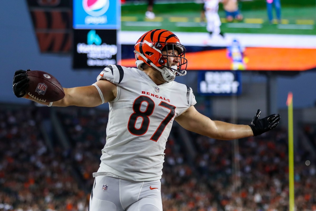 Cincinnati Bengals tight end Justin Rigg (87) reacts after scoring a touchdown against the Los Angeles Rams in the second half at Paycor Stadium.