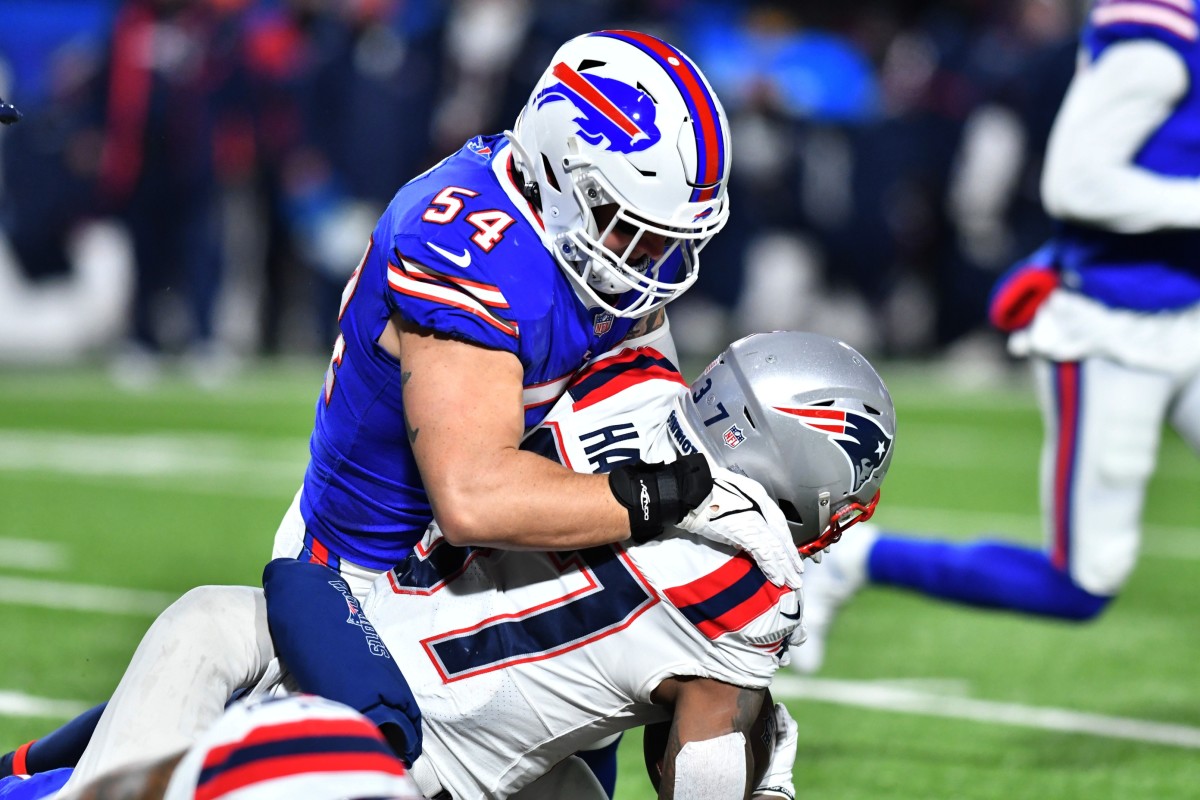 Jan 15, 2022; Buffalo Bills outside linebacker A.J. Klein (54) tackles New England Patriots running back Damien Harris (37) in an AFC Wild Card playoff game. Mandatory Credit: Mark Konezny-USA TODAY Sports