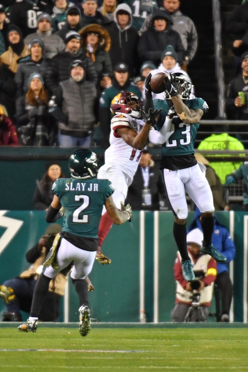 Philadelphia Eagles safety C.J. Gardner-Johnson (23) intercepts a pass intended for Washington receiver Terry McLaurin (17). Mandatory Credit: Eric Hartline-USA TODAY Sports