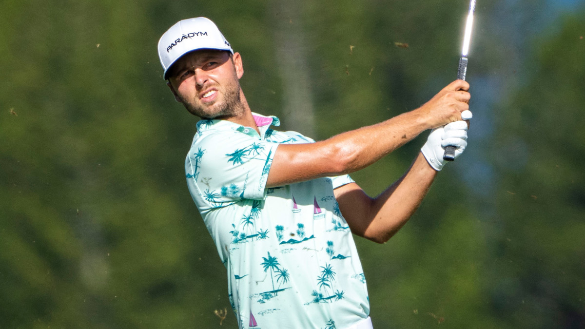 Adam Svensson hits his fairway shot on the fourth hole during the second round of the Sentry Tournament of Champions.