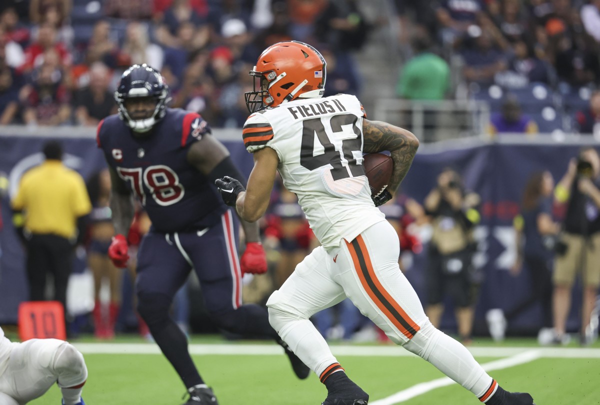 Dec 4, 2022; Houston, Texas, USA; Cleveland Browns linebacker Tony Fields II (42) returns an interception for a touchdown during the fourth quarter against the Houston Texans at NRG Stadium.