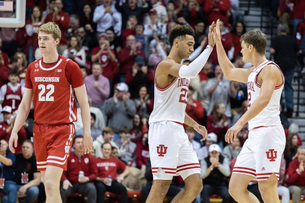 Indiana forward Trayce Jackson-Davis (23) and forward Miller Kopp (12) celebrate a made basket in the second half against the Wisconsin Badgers.