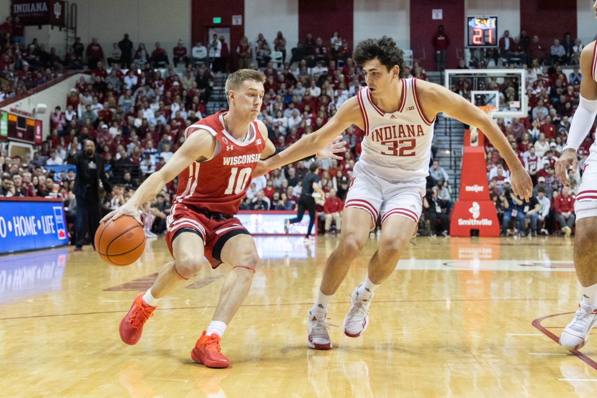 Indiana guard Trey Galloway (32) plays defense against Wisconsin guard Isaac Lindsey (10) in the second half of the Hoosiers matchup with the Badgers.