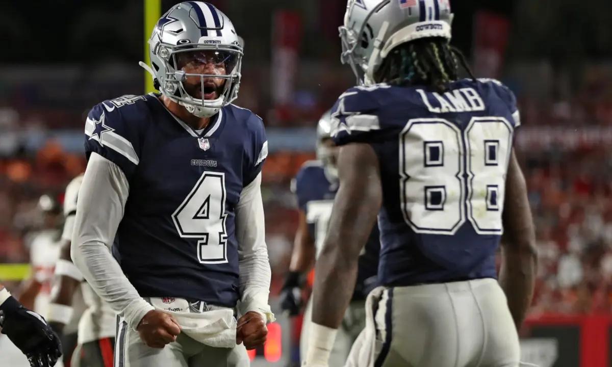 Prescott and Lamb celebrate a touchdown during last season's playoff game against the Tampa Bay Buccaneers.