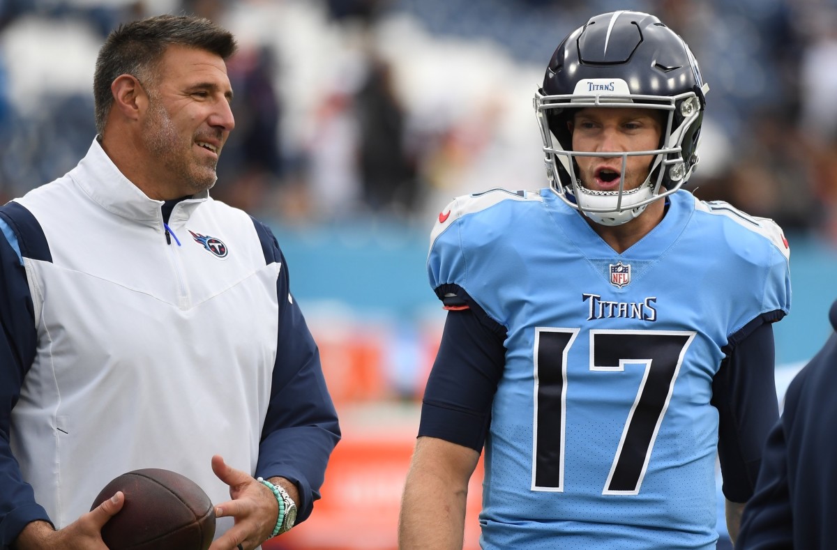Tennessee Titans head coach Mike Vrabel (left) and quarterback Ryan Tannehill (17) talk before the game against the Cincinnati Bengals at Nissan Stadium.