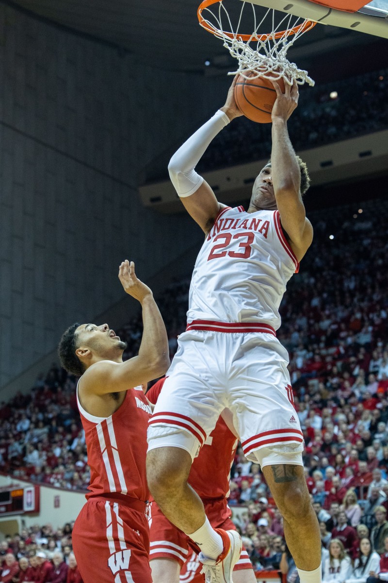 Indiana Hoosiers forward Trayce Jackson-Davis (23) shoots the ball while Wisconsin Badgers guard Jordan Davis (2) defends in the first half at Simon Skjodt Assembly Hall.