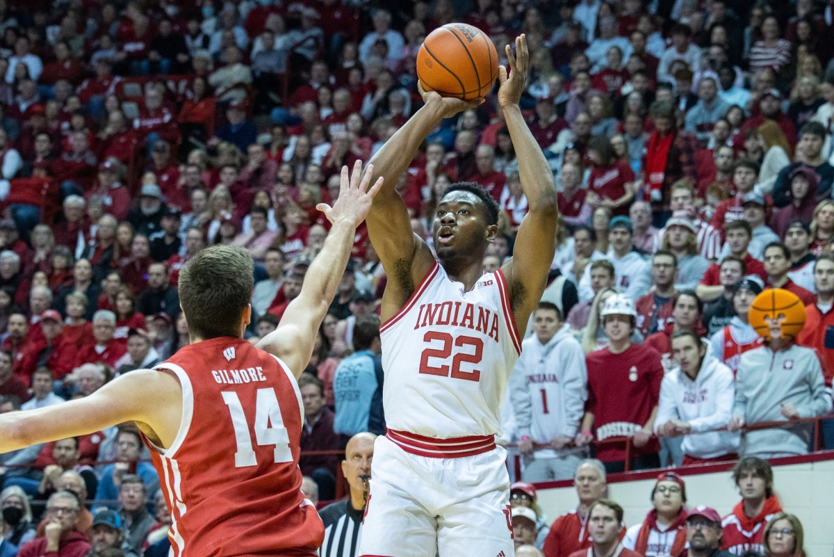 Indiana Hoosiers forward Jordan Geronimo (22) shoots the ball while Wisconsin Badgers forward Carter Gilmore (14) defends in the first half.