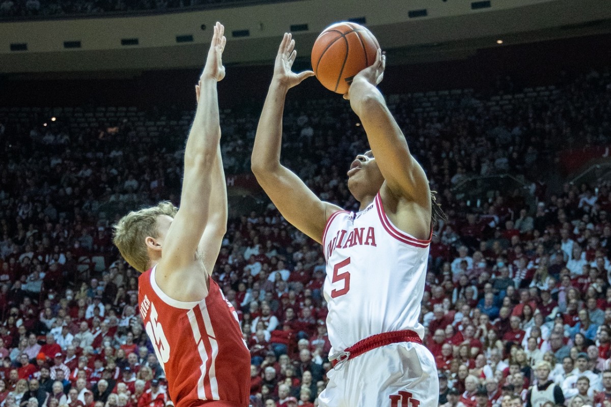 Indiana Hoosiers forward Malik Reneau (5) shoots the ball while Wisconsin Badgers forward Markus Ilver (35) defends in the first half at Simon Skjodt Assembly Hall.