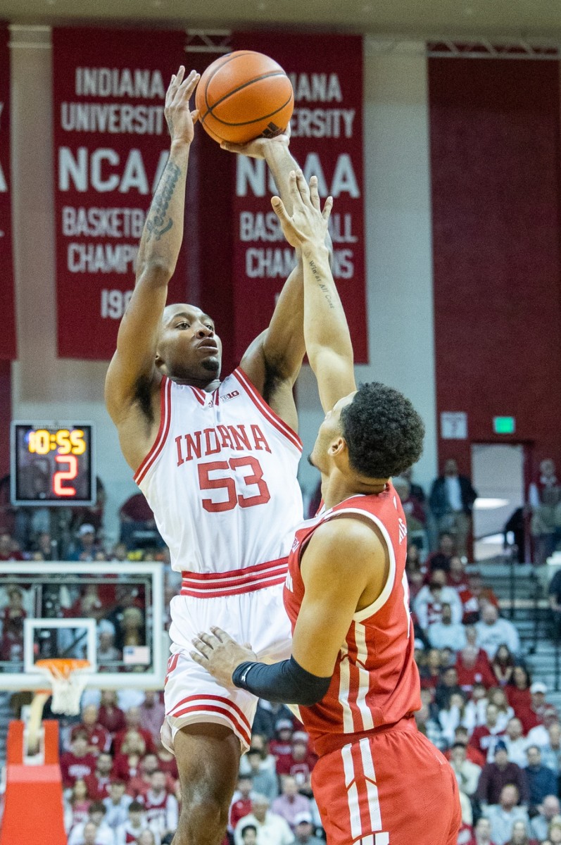 Indiana Hoosiers guard Tamar Bates (53) shoots the ball while Wisconsin Badgers guard Jordan Davis (2) defends in the first half at Simon Skjodt Assembly Hall.