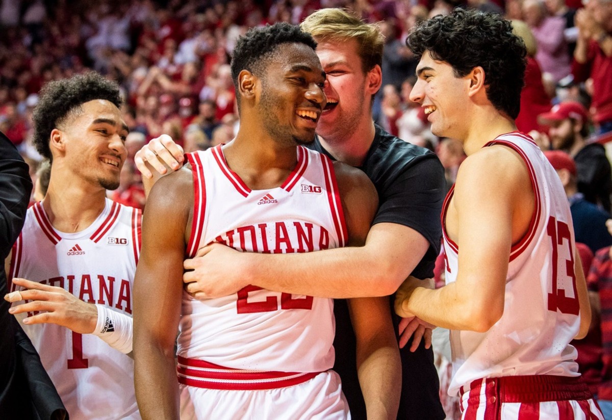 Indiana's Jordan Geronimo (22) is congradulated by teammates after coming out during the second half of the Indiana versus Wisconsin men's basketball game at Simon Skjodt Assembly Hall on Saturday, Jan. 14, 2023.