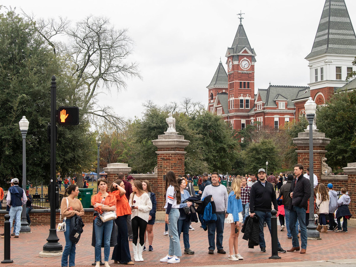 Fans walk at Auburn’s Toomer’s corner