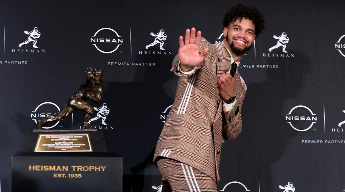 Dec 10, 2022; New York, NY, USA; Southern California quarterback Caleb Williams poses for photos during a press conference in the Astor Ballroom at the New York Marriott Marquis in New York, NY, after winning the 2022 Heisman Trophy.