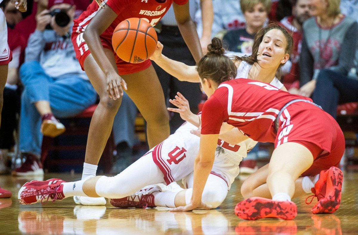 Indiana's Yarden Garzon (12) grabs a loose ball during the first half of the Indiana versus Wisconsin women's basketball game at Simon Skjodt Assembly Hall on Sunday, Jan. 15, 2023.