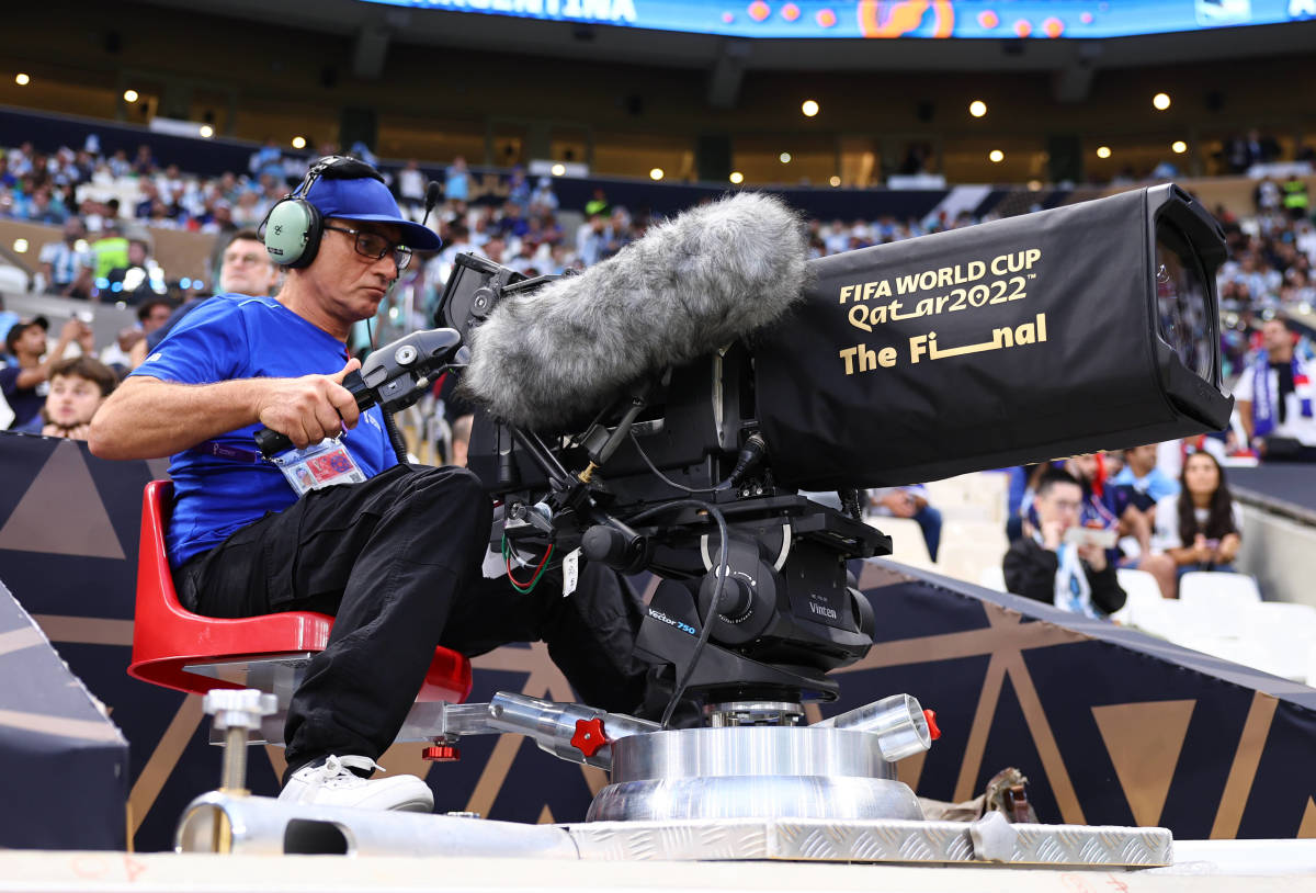 A TV camera operator at Lusail Stadium pictured filming the 2022 World Cup final between Argentina and France