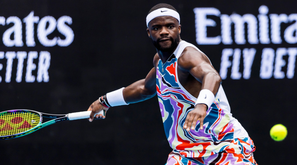 American tennis player Frances Tiafoe competes in round one of the 2023 Australian Open.