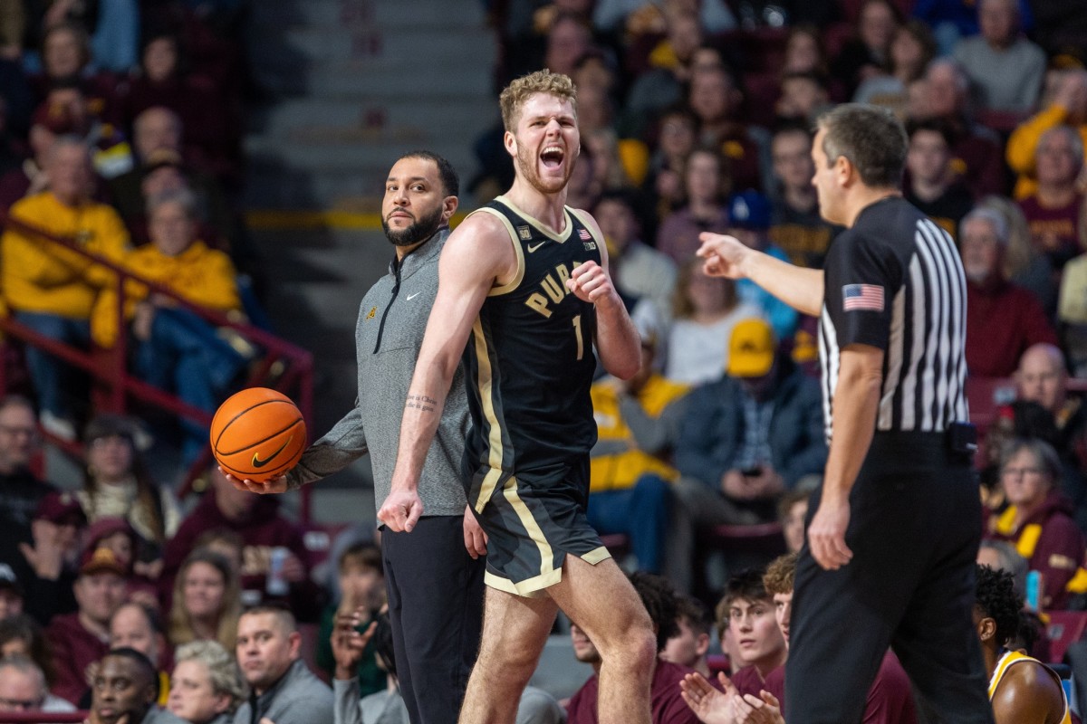 Jan 19, 2023; Minneapolis, Minnesota, USA; Purdue Boilermakers forward Caleb Furst (1) celebrates in front of Minnesota Golden Gophers head coach Ben Johnson after a foul is called in the second half at Williams Arena.