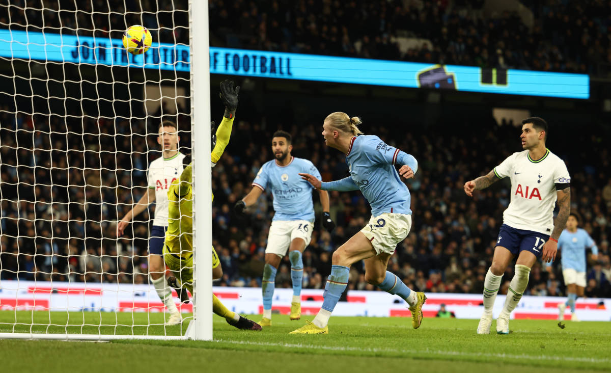 Manchester City forward Erling Haaland pictured (center) scoring his first goal of 2023