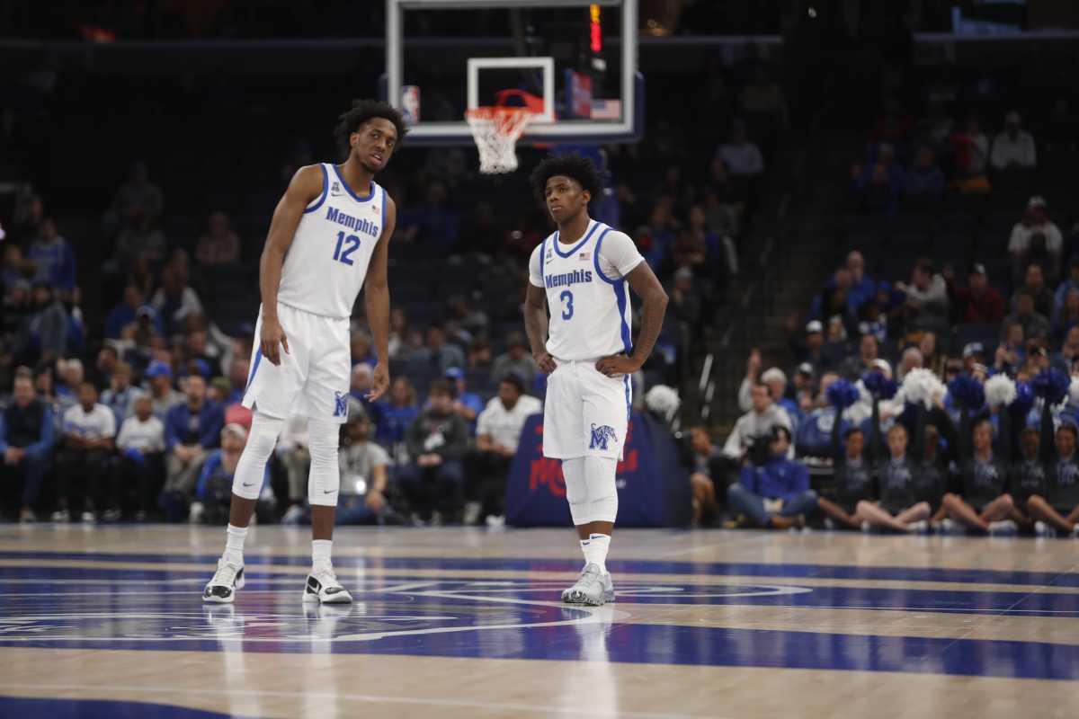 The Memphis Tigers forward DeAndre Williams (12) talks to teammate Kendric Davis (3) during a game against the ECU Pirates on Jan. 7, 2022 at the Fedex Forum in Memphis. Memphis Tigers vs ECU Pirates