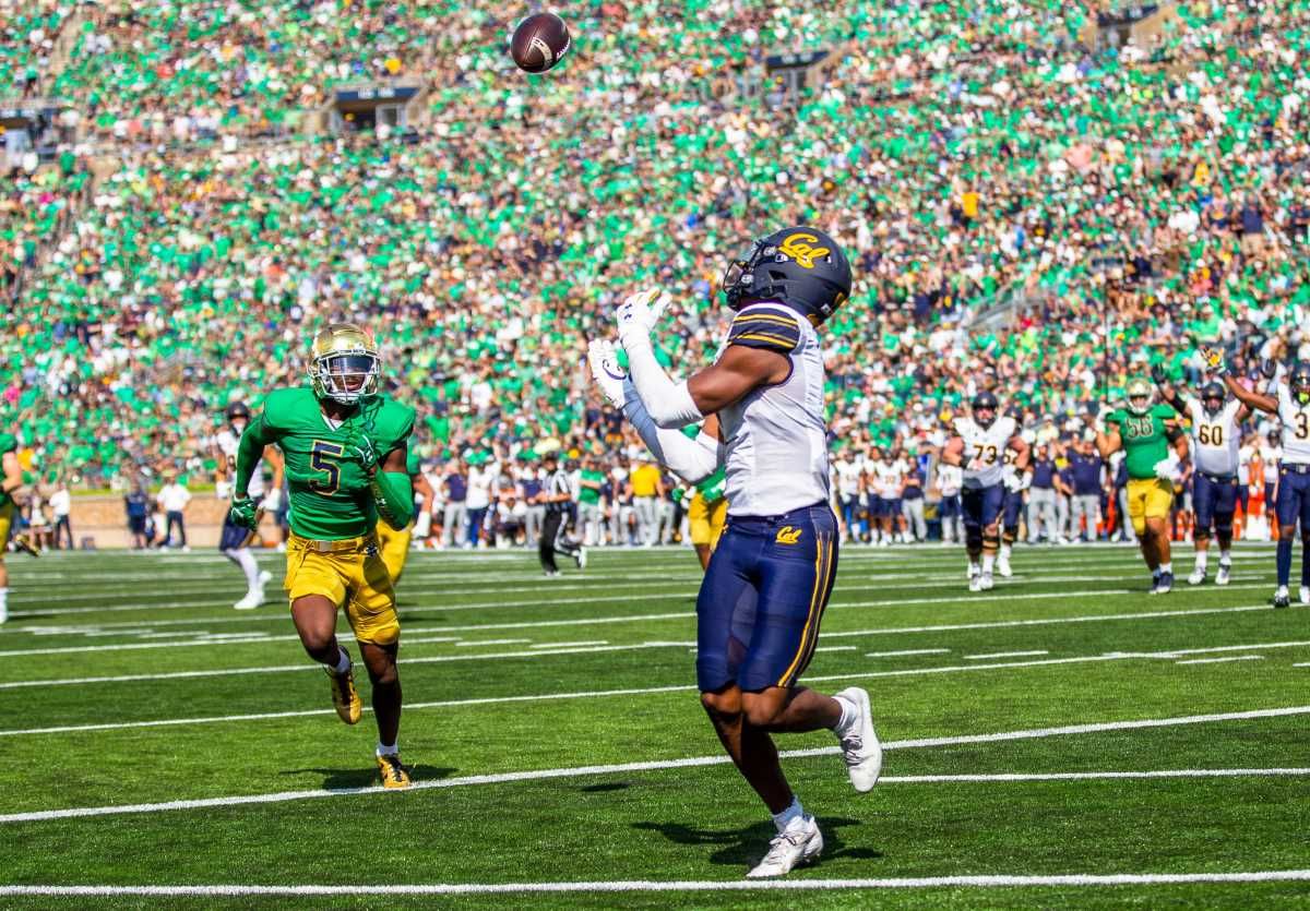 California wide receiver J.Michael Sturdivant (7) makes a catch for a touchdown as Notre Dame defensive back Cam Hart (5) chases him during the Notre Dame vs. California NCAA football game Saturday, Sept. 17, 2022 at Notre Dame Stadium in South Bend. Notre Dame Vs California