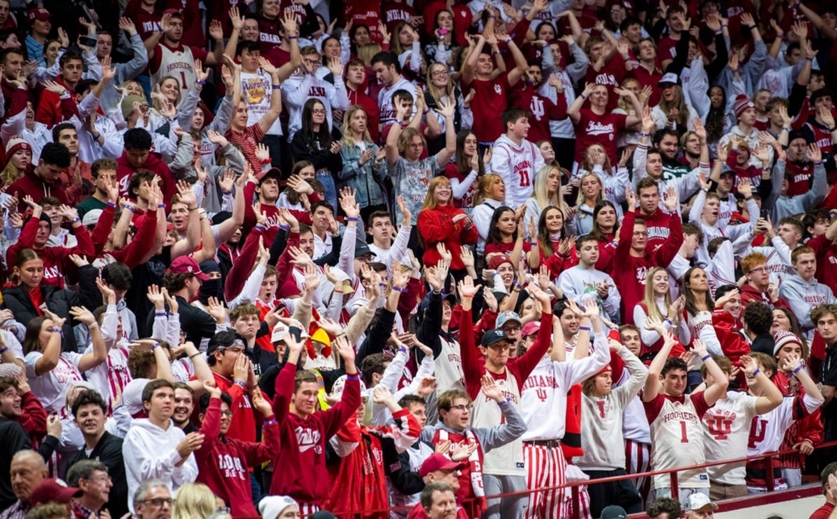 Indiana students join Trayce Jackson-Davis (23) in celebration during the second half of the Indiana versus Michigan State.