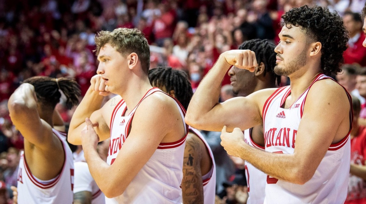 Indiana's Anthony Leal (3) and Logan Duncomb (51) point to their biceps after a Trayce Jackson-Davis basket versus Michigan State.