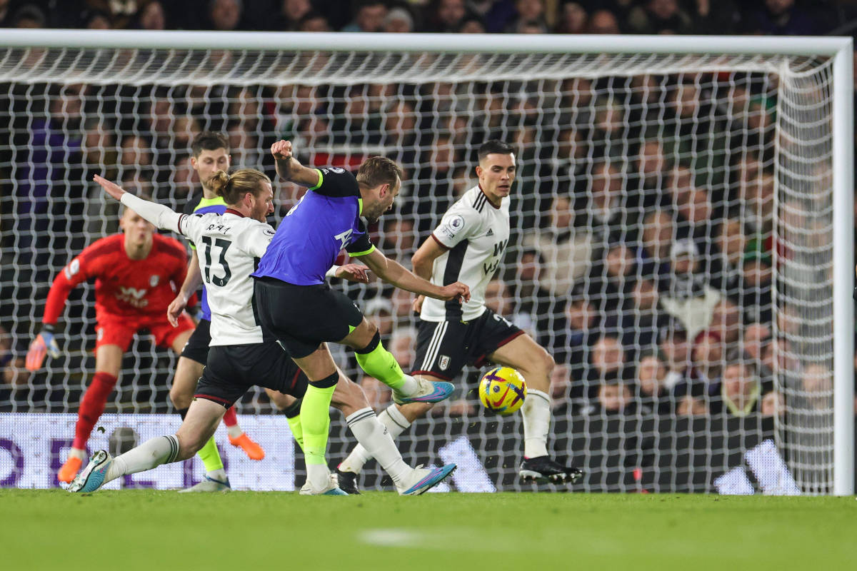 Harry Kane pictured (center) shooting to score the 266th goal of his Tottenham career during a 1-0 win at Fulham in January 2023