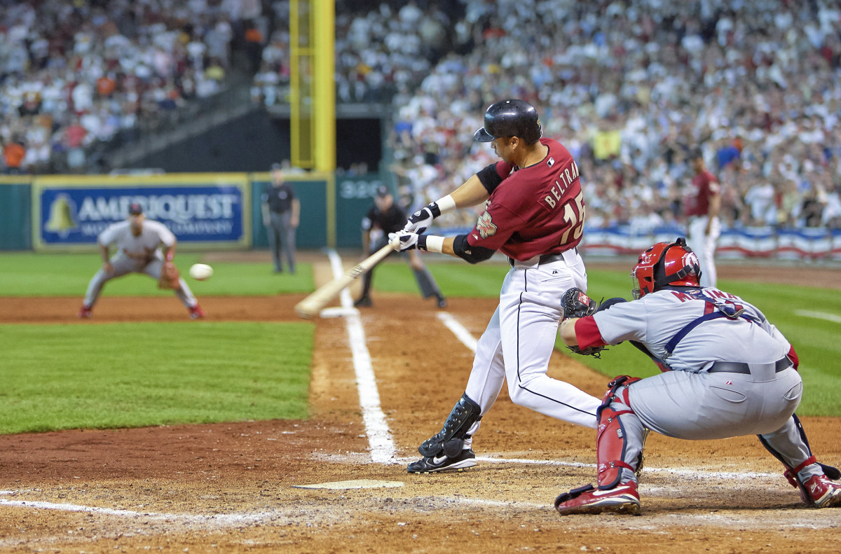 Carlos Beltrán bats against the Cardinals in the 2004 NLCS.