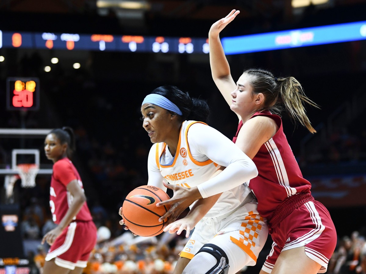 Tennessee forward Jasmine Franklin (14) tries to get around Indiana forward Lilly Meister (52) during the NCAA college basketball game on Monday, November 14, 2022 in Knoxville, Tenn.