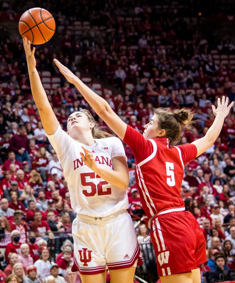 Indiana's Lilly Meister (52) shoots past Wisconsin's Julie Pospisilova (5) during the second half of the Indiana versus Wisconsin women's basketball game at Simon Skjodt Assembly Hall on Sunday, Jan. 15, 2023.