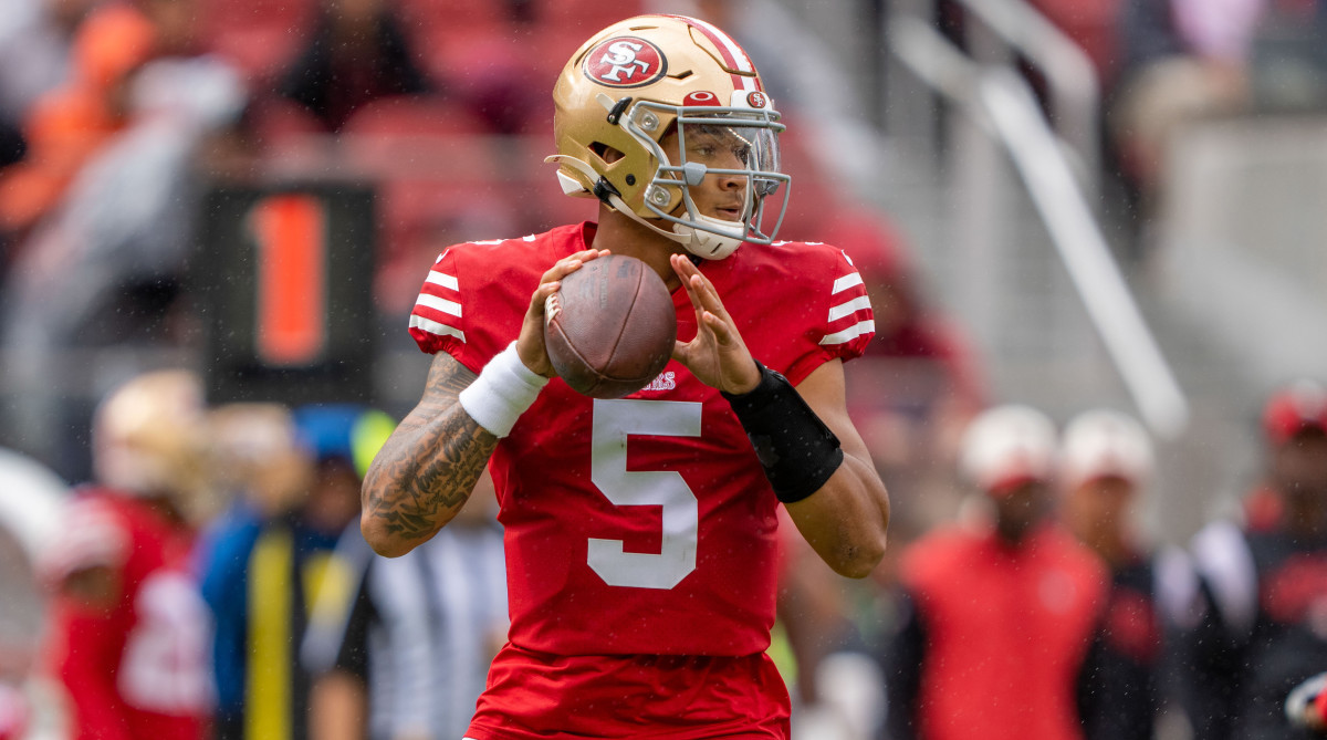 49ers quarterback Trey Lance drops back to pass against the Seahawks.