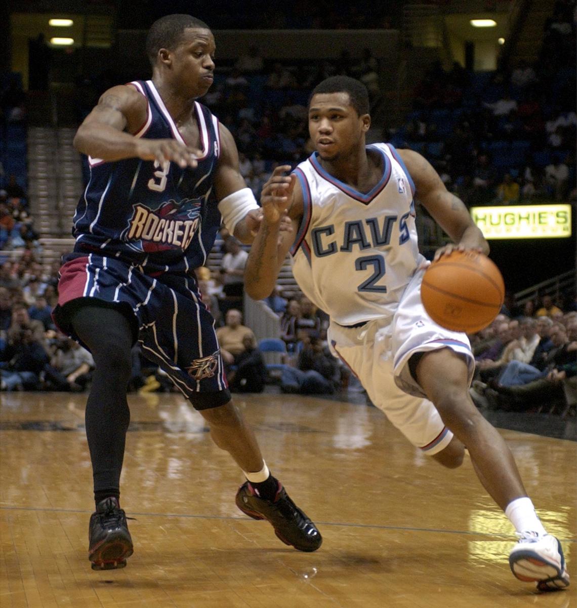 Cleveland Cavaliers' guard Dajuan Wagner (R) drives against Houston Rockets' guard Steve Francis (L) in the third quarter of ther NBA game 05 February 2003 at Gund Arena in Cleveland, OH. Cleveland defeated Houston 105-102. AFP Photo/David Maxwell (Photo by DAVID MAXWELL / AFP) (Photo credit should read DAVID MAXWELL/AFP via Getty Images)