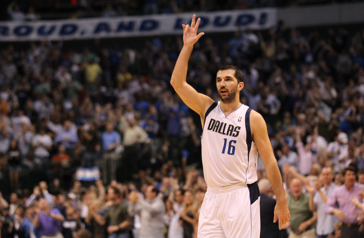 Apr 25, 2011; Dallas, TX, USA; Dallas Mavericks forward Peja Stojakovic (16) celebrates a three point basket in the second half of game five against the Portland Trail Blazers of the first round of the 2011 NBA playoffs at American Airlines Center.