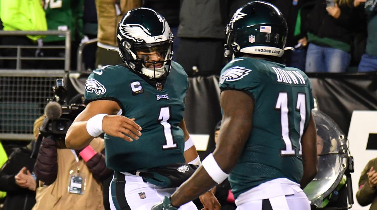 Jan 21, 2023; Philadelphia, Pennsylvania, USA; Philadelphia Eagles quarterback Jalen Hurts (1) celebrates his touchdown with wide receiver A.J. Brown (11) during the second quarter against the New York Giants during an NFC divisional round game at Lincoln Financial Field.