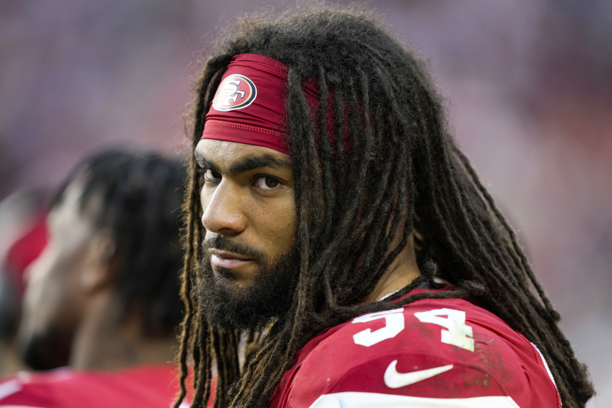 A headshot of Fred Warner, on the sideline during a 49ers game