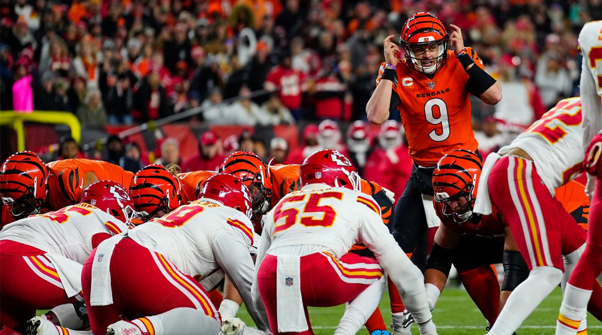 Dec 4, 2022; Cincinnati, Ohio, USA; Cincinnati Bengals quarterback Joe Burrow (9) makes an adjustment as the Bengals go for it on 4th and 1 in the second quarter of a Week 13 NFL game at Paycor Stadium.