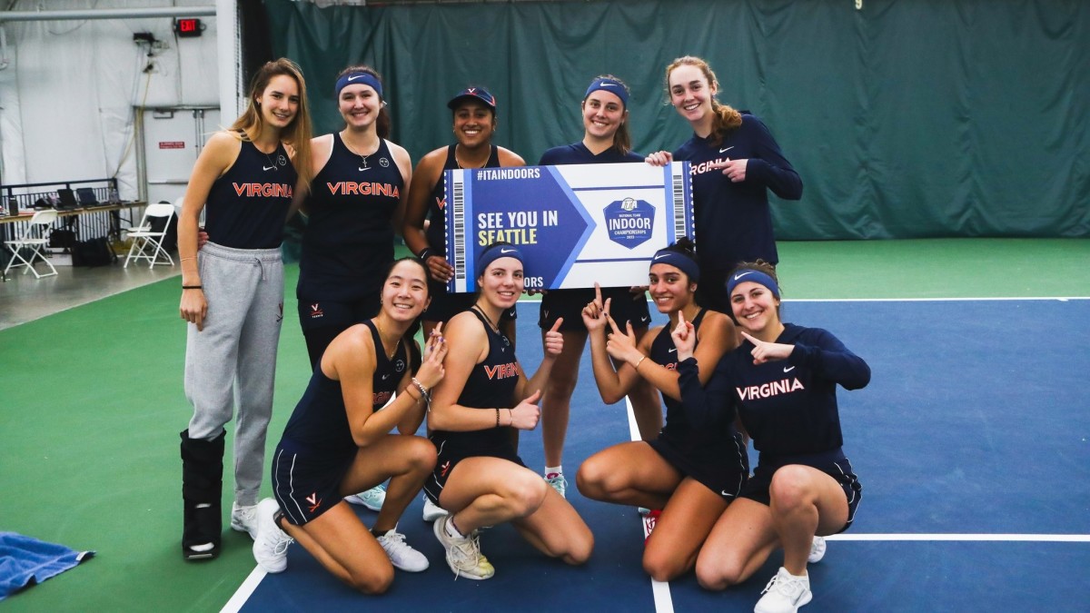 The Virginia women's tennis team celebrates after securing a bid to the 2023 ITA National Indoor Team Championships in Seattle.