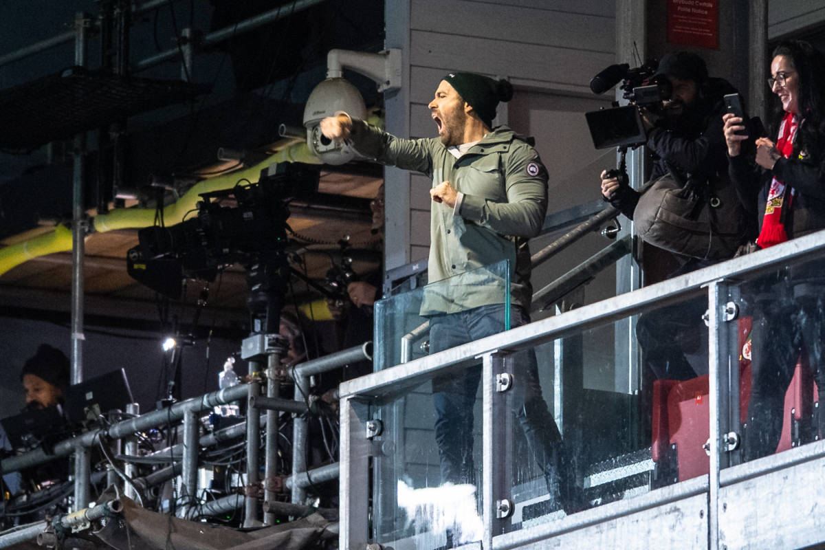 Wrexham AFC co-owner Ryan Reynolds pictured celebrating a goal during his team's FA Cup fourth round game against Sheffield United in January 2023