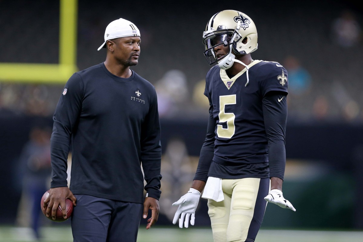 Aug 29, 2019; New Orleans Saints quarterback Teddy Bridgewater (5) talks to wide receivers coach Ronald Curry. Mandatory Credit: Chuck Cook-USA TODAY Sports